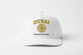 Dubai Cap with Dyukon Global gold globe logo